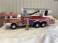 Animated fire truck with figure, needs batteries