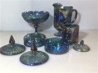 Lot of assorted blue carnival glass pieces.