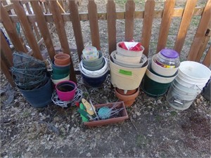 buckets, lots of flower pots and planters