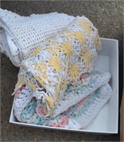 box of doilies and table runners