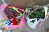 bag of Christmas linens and garland