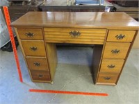 antique mahogany 9-drawer desk (42in wide)
