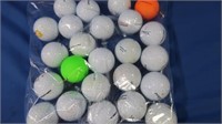 24 used Titleist Golf Balls