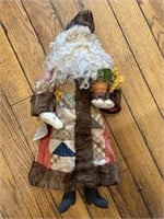 Folk Santa with vintage quilt and lamb fur