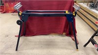 Mitre saw stand. Measures 4 ft long by 38 inches