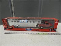 Ford F350 pulling a livestock trailer; 1:32 scale