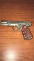 Army 45 cast iron cap gun. Made in USA. Uses roll