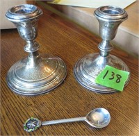 Sterling weighted candle sticks & spoon