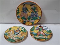 Three Italian handpainted ceramic wall plates