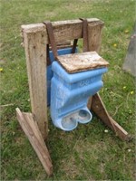 Small Blue Plastic Feeders on Wood Stand