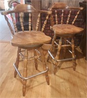 A Pair of Maple Swivel Bar Stools