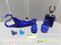 Blue glassware including vases, bird figurines, de