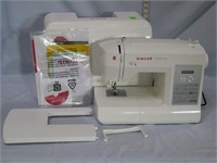 Singer Sewing machine like new with cover