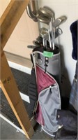 Set of tour select golf clubs, gray/burgundy bag