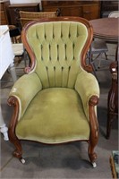 ANTIQUE UPHOLSTERED ARM CHAIR