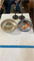 Various cake cooking pans, wooden candle holders.