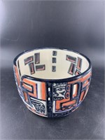 Tlingit hand made pottery bowl depicting rolling l