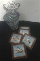 Group of coasters and a 5.5 inch metal pail