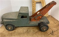 Wooden toy tow truck