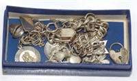 Silver charm bracelet with approx 14 charms