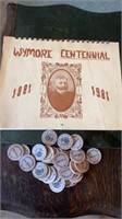 WYMORE NE CENTENNIAL CALENDAR AND WOODEN TOKEN.