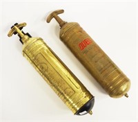 Two vintage brass fire extinguishers