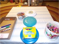 bank advertising frisbees and markers and crayons