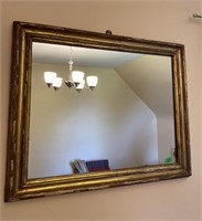 Gold coloured framed mirror-30x24”