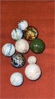 10 glazed China marbles 7/16” to 3/4”. Very good