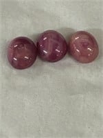 Trio of natural cut and polished cabachon rubies