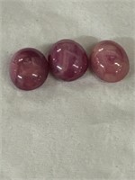 Trio of natural cut and polished cabachon rubies