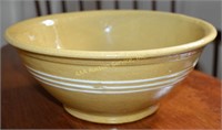 White banded yellow ware mixing bowl. Fine hairlin