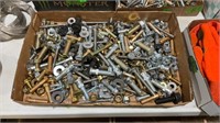 Large bolt, flat washers and nuts