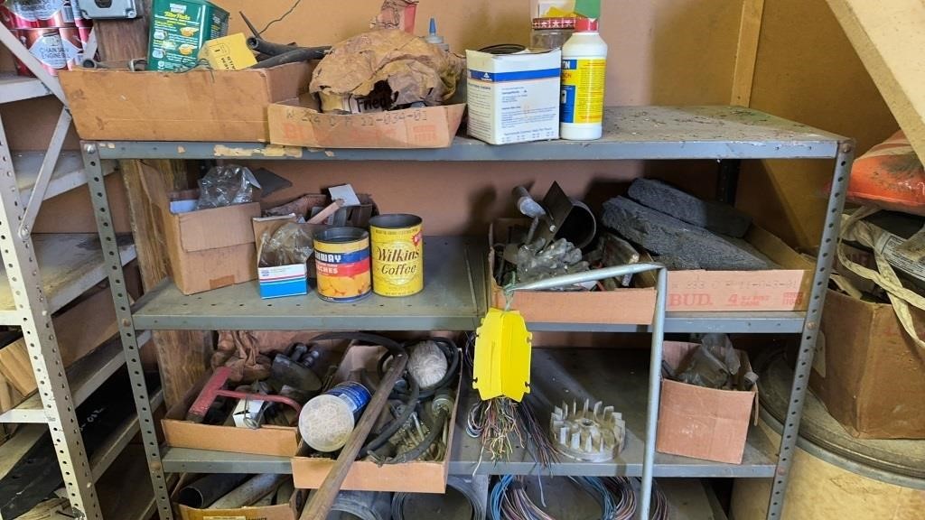 Contents of the metal shelf, tools, nuts, and
