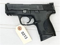 S&W M&P40c 40ca pistol, s#HTB6028 - background
