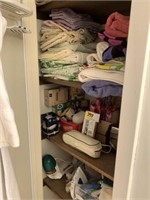 Bathroom Closet full of items