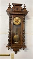 Antique tall case wall clock with brass
