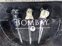 Unopened Bombay dog head wine stoppers