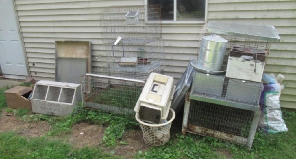 Large group of rabbit/ pet cages.