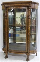 Lion Carved Tiger Oak Curved Glass China Cabinet