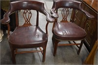 Two Vintage Leather and Wood Studded Arm Chairs