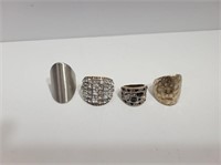 (4) Assorted Silver Toned Rings