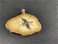 Fossilized ivory cross piece pendant with goose sc