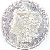 Coin 1883-CC  Morgan Silver Dollar In Almost Unc.