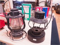 Two vintage metal lanterns: one marked C.C.C.