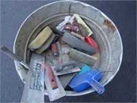 Utility Tub filled with drywall related tools