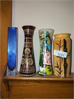 4 different bud vases- Yugoslavian carved wood