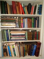 Large Quantity of Books in Shelf in Dining Room