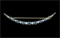 14K Yellow gold blue topaz and pearl crescent pin