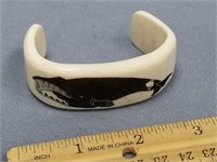 Ivory bracelet scrimmed with whale        (f 16)